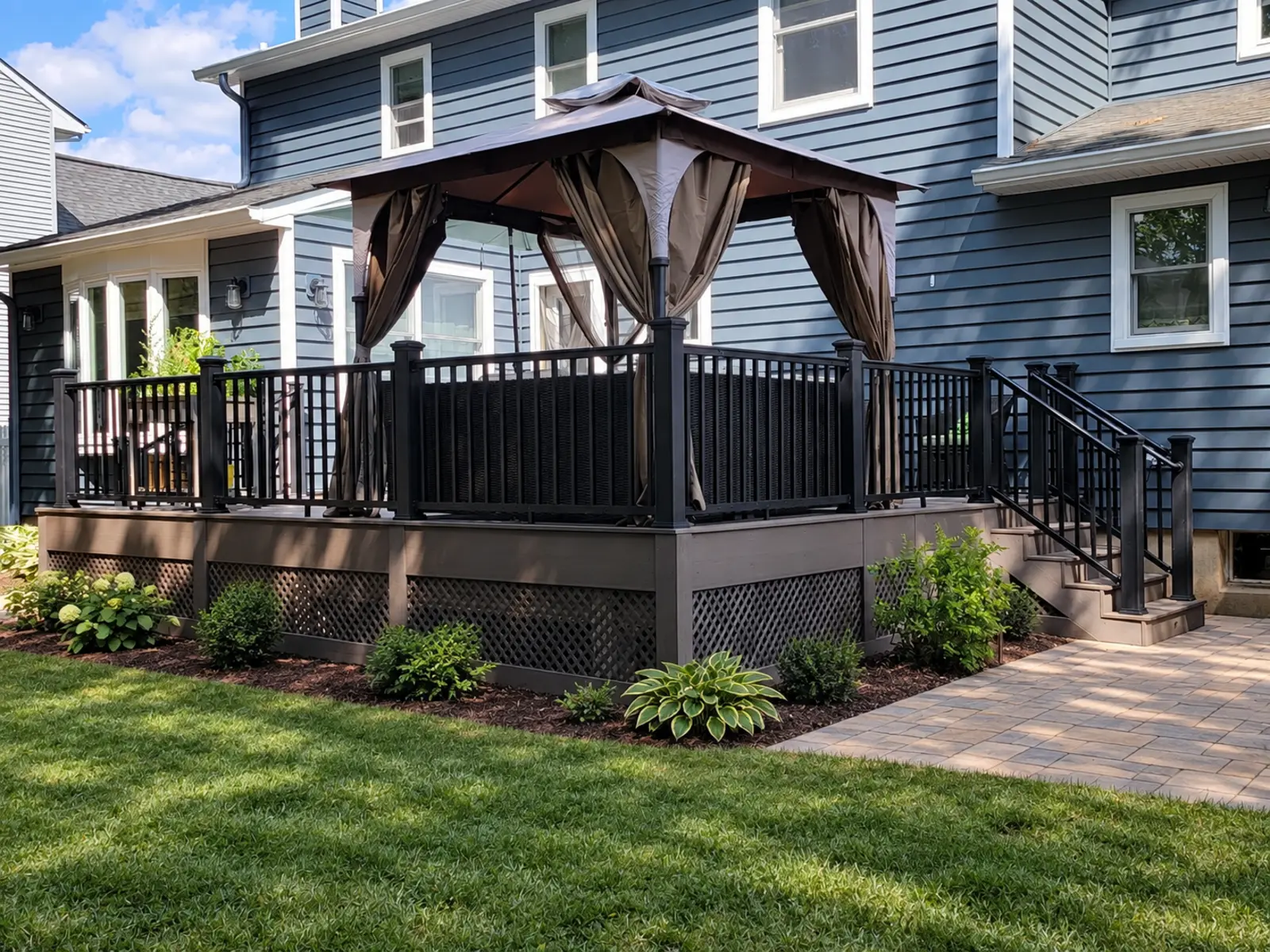 Real covered deck project with finished landscaping